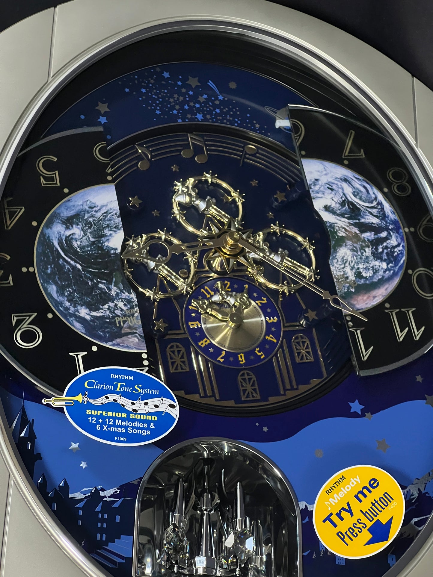 Rhythm “Peaceful Cosmos II” Moving Earth Dial Magic Motion Musical Wall Clock - 4MH408WU19
