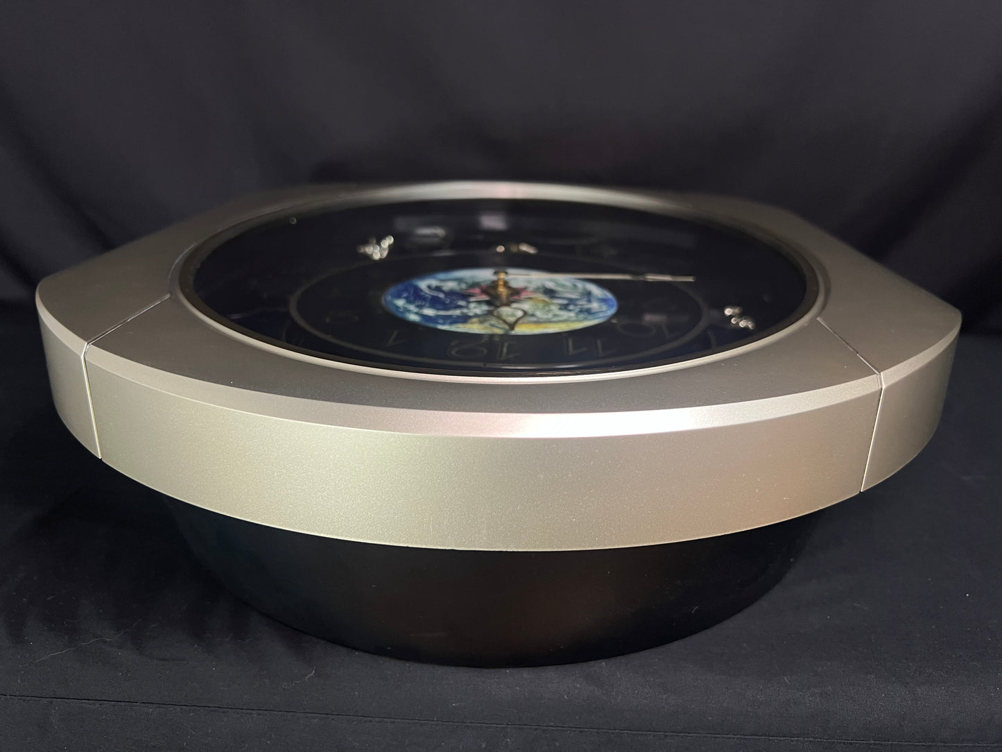 Rhythm “Peaceful Cosmos” Moving Earth Dial Magic Motion Musical Wall Clock with Popular Melodies - 4MH751AR19