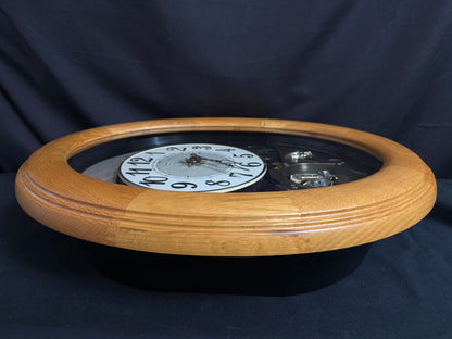 Rhythm "Timecracker Golden Oak" Moving Dial Magic Motion Musical Wooden Wall Clock with Popular Melodies - 4MH782-R07