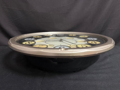 Seiko QXM106SRH "Twirling Numbers" Melodies in Motion Musical Wall Clock with Moving Dial