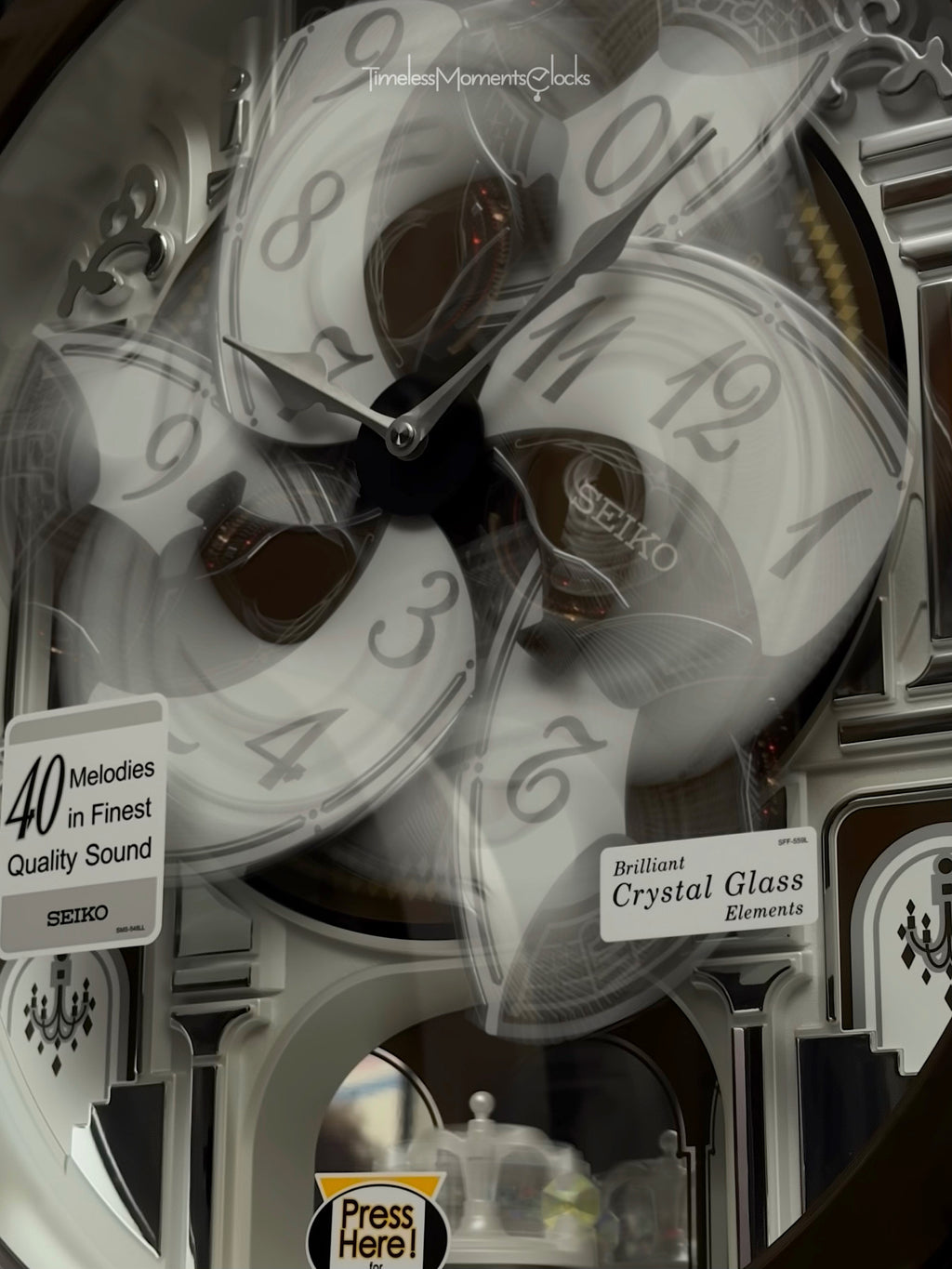 Seiko QXM615BRH “Snow Castle” Melodies in Motion Dancing Dial Musical Wall Clock with 40 Songs