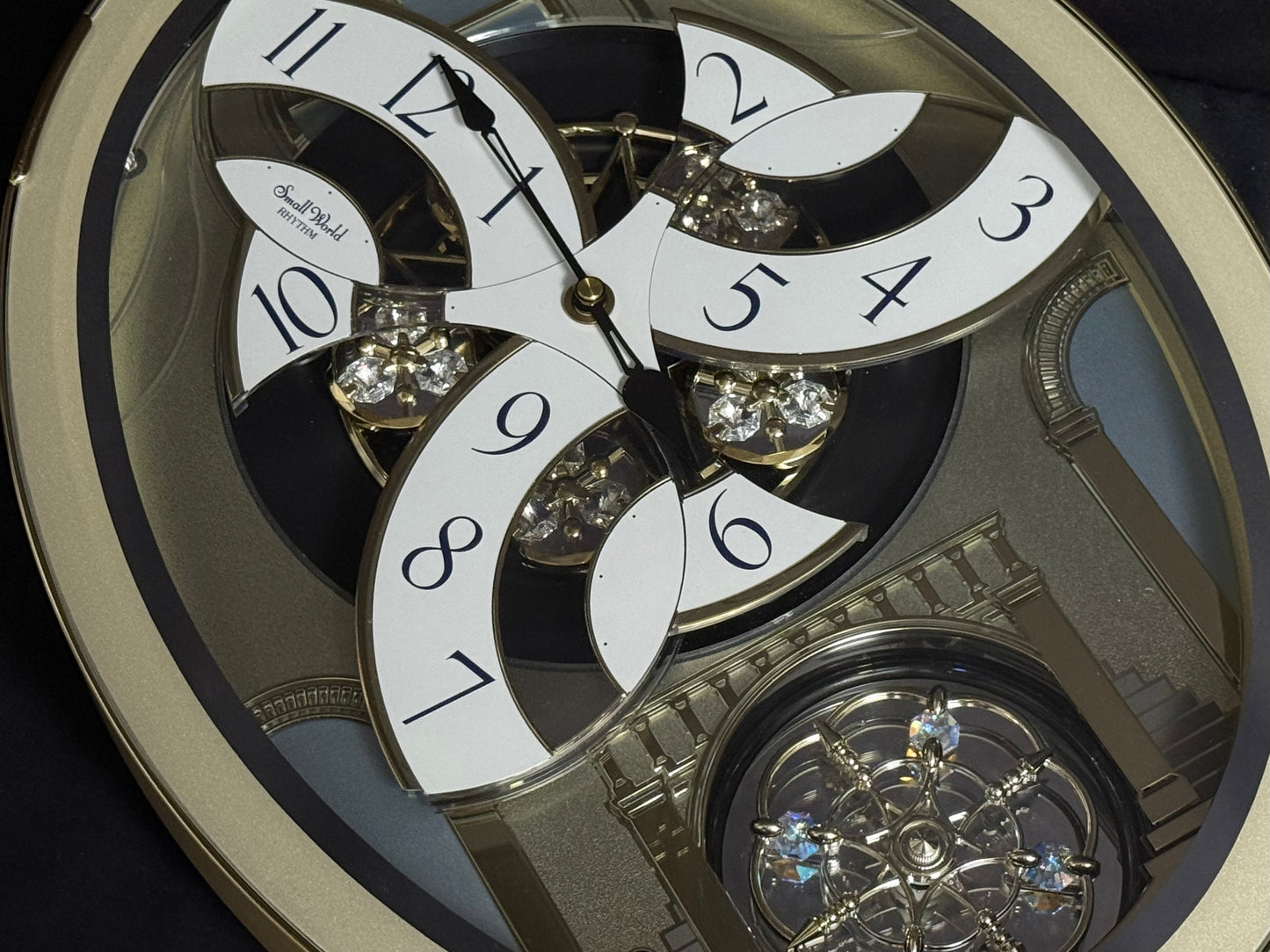 Rhythm "Classic Brilliance" Moving Dial Magic Motion Musical Wall Clock - 4MH787PD18