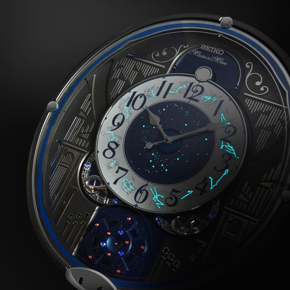 Seiko QXM393NRH “Galaxy Constellations” Astrology-Themed Melodies in Motion Moving Dial Musical Wall Clock with Luminous Dial