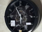 Seiko QXM621KRH “Onyx” Melodies in Motion Dancing Dial Musical Wall Clock with 40 Songs
