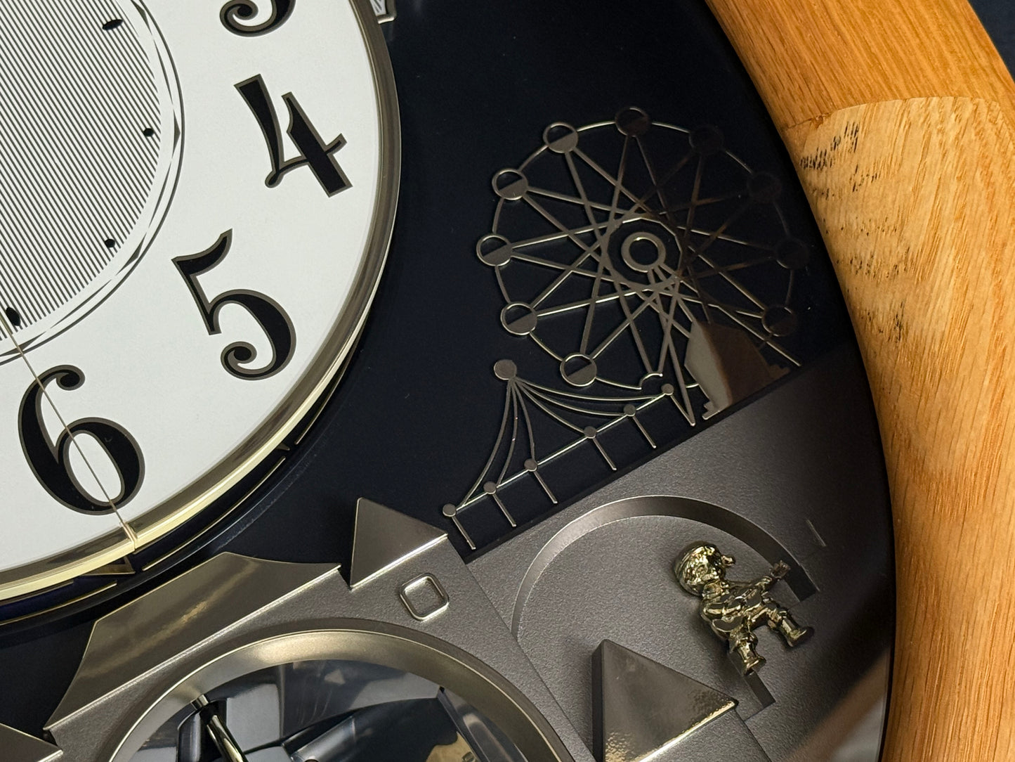 Rhythm "Timecracker Golden Oak" Moving Dial Magic Motion Musical Wooden Wall Clock with Popular Melodies - 4MH782-R07