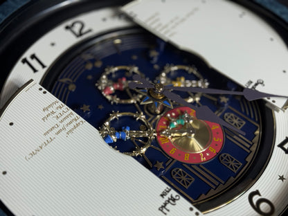 Rhythm “Small World Partage Home (Blue)” Moving Dial Magic Motion Musical Wall Clock with Popular Melodies - 4MH754RH04
