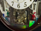 Rhythm "Harmony Blessing" Moving Dial Magic Motion Musical Wall Clock - 4MH423WR23