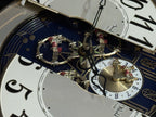 Rhythm "Timecracker Golden Oak" Moving Dial Magic Motion Musical Wooden Wall Clock with Popular Melodies - 4MH782-R07
