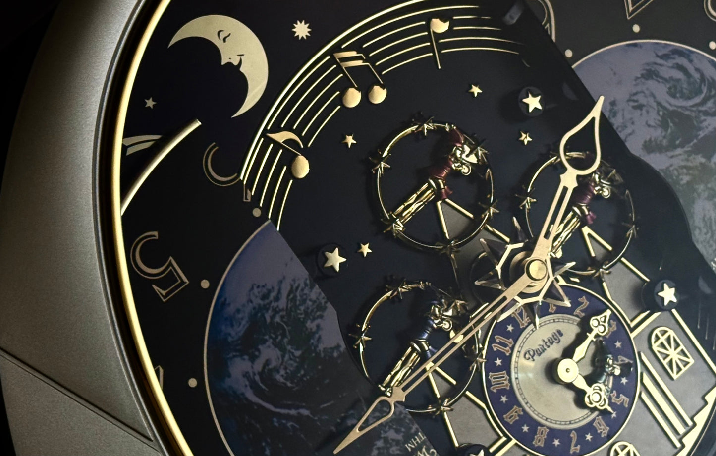 Rhythm “Peaceful Cosmos Entertainer” Moving Earth Dial Magic Motion Musical Wall Clock with Popular Melodies - 4MH839WB19