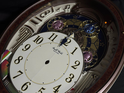 Rhythm "Harmony Blessing" Moving Dial Magic Motion Musical Wall Clock - 4MH423WR23