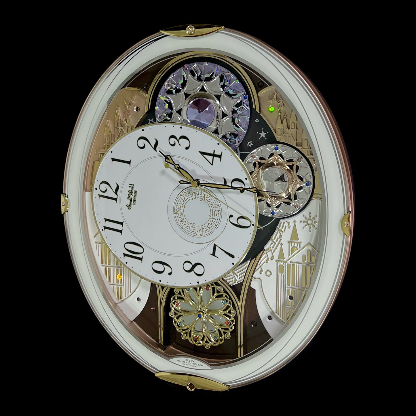 Rhythm "Small World Noel (White)" Magic Motion Musical Wall Clock from Japan with Rotating Dial - 4MN509RH03