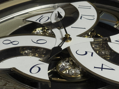 Rhythm "Classic Brilliance" Moving Dial Magic Motion Musical Wall Clock - 4MH787PD18