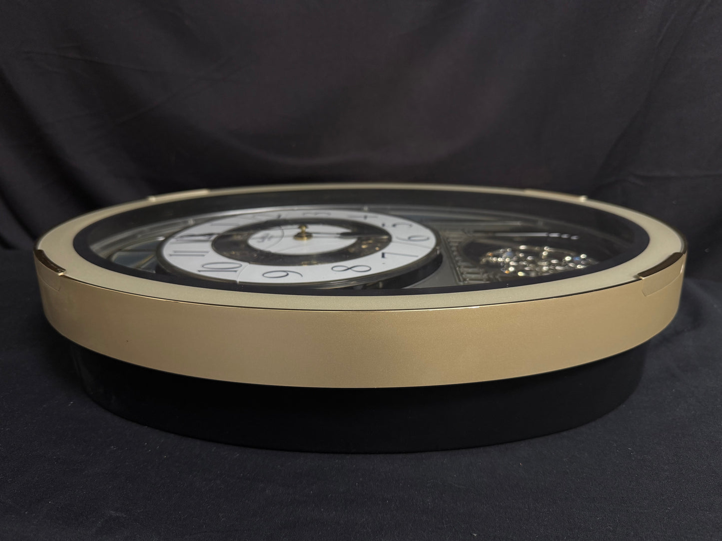 Rhythm "Classic Brilliance" Moving Dial Magic Motion Musical Wall Clock - 4MH787PD18