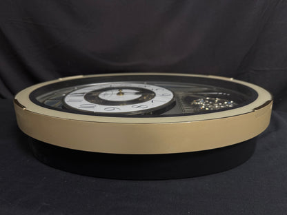 Rhythm "Classic Brilliance" Moving Dial Magic Motion Musical Wall Clock - 4MH787PD18