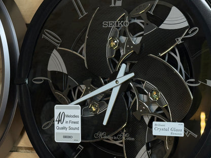 Seiko QXM621KRH “Onyx” Melodies in Motion Dancing Dial Musical Wall Clock with 40 Songs