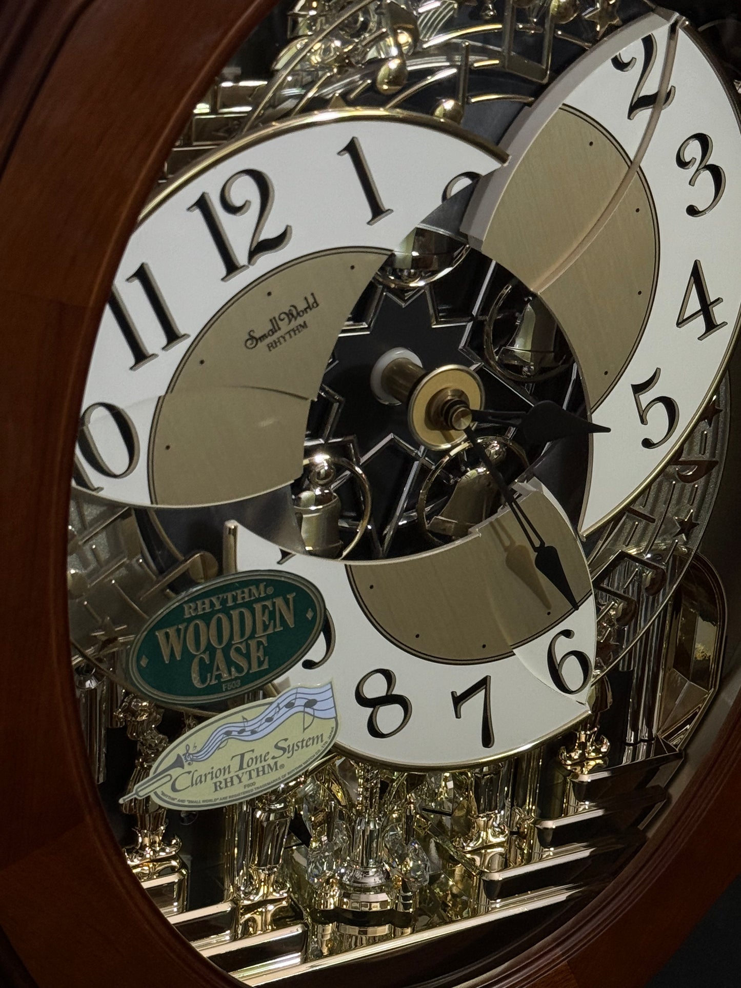 Rhythm "CTS Nostalgia" Moving Dial Magic Motion Musical Wooden Wall Clock with Popular Melodies - 4MH780-R06