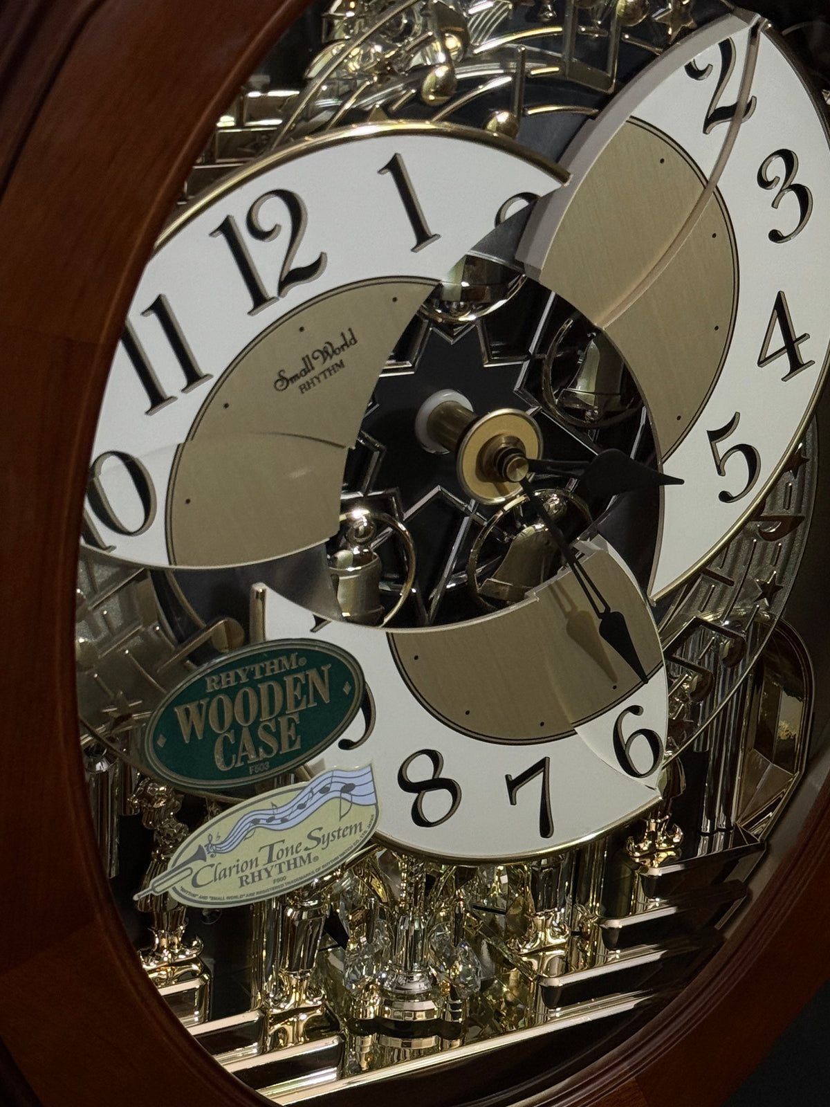 Rhythm "CTS Nostalgia" Moving Dial Magic Motion Musical Wooden Wall Clock with Popular Melodies - 4MH780-R06
