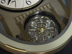 Rhythm "CTS Brilliance" Moving Dial Magic Motion Musical Wall Clock with Popular Melodies - 4MH787-R18