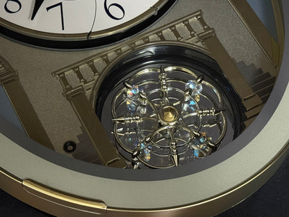 Rhythm "CTS Brilliance" Moving Dial Magic Motion Musical Wall Clock with Popular Melodies - 4MH787-R18