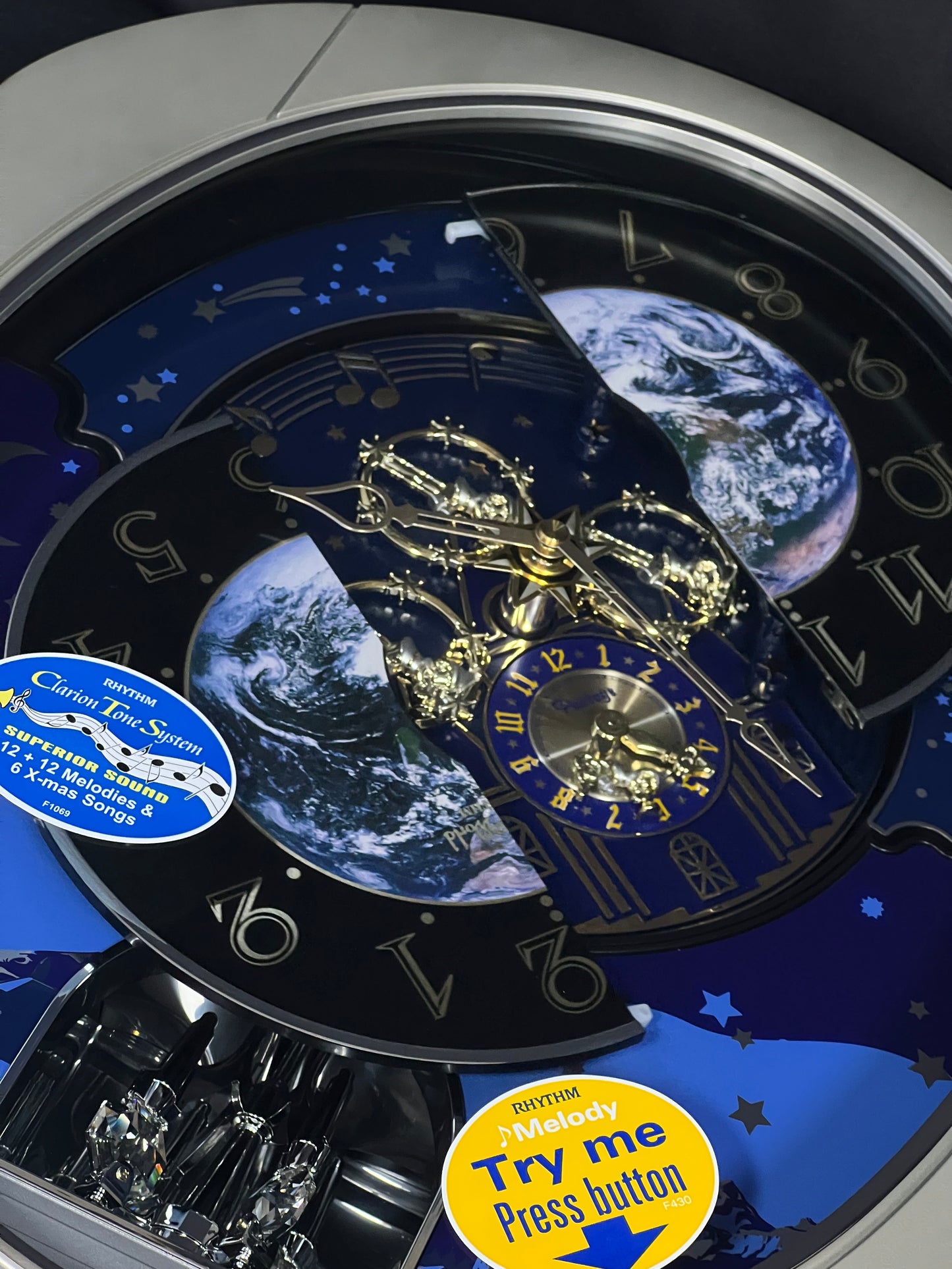 Rhythm “Peaceful Cosmos II” Moving Earth Dial Magic Motion Musical Wall Clock - 4MH408WU19