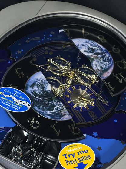 Rhythm “Peaceful Cosmos II” Moving Earth Dial Magic Motion Musical Wall Clock - 4MH408WU19
