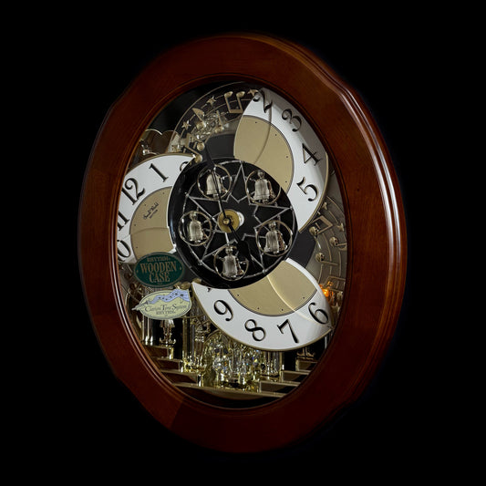 Rhythm "CTS Nostalgia" Moving Dial Magic Motion Musical Wooden Wall Clock with Popular Melodies - 4MH780-R06