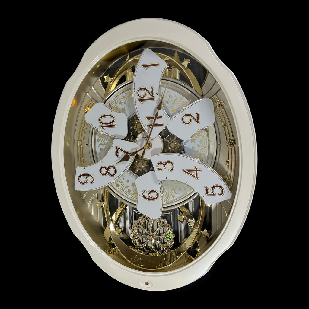 Rhythm "Marvelous Pearl" Magic Motion Musical Wall Clock with Moving Dial - 4MH427WU03