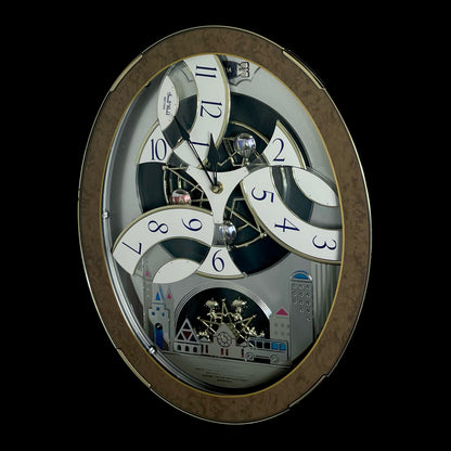 Rhythm “Tri-Cracker” Magic Motion Musical Wall Clock with Moving Dial and Balloons - 4MH759NR06