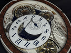Rhythm "Gala III" Magic Motion Musical Wall Clock with Rotating Dial - 4MH447WU23
