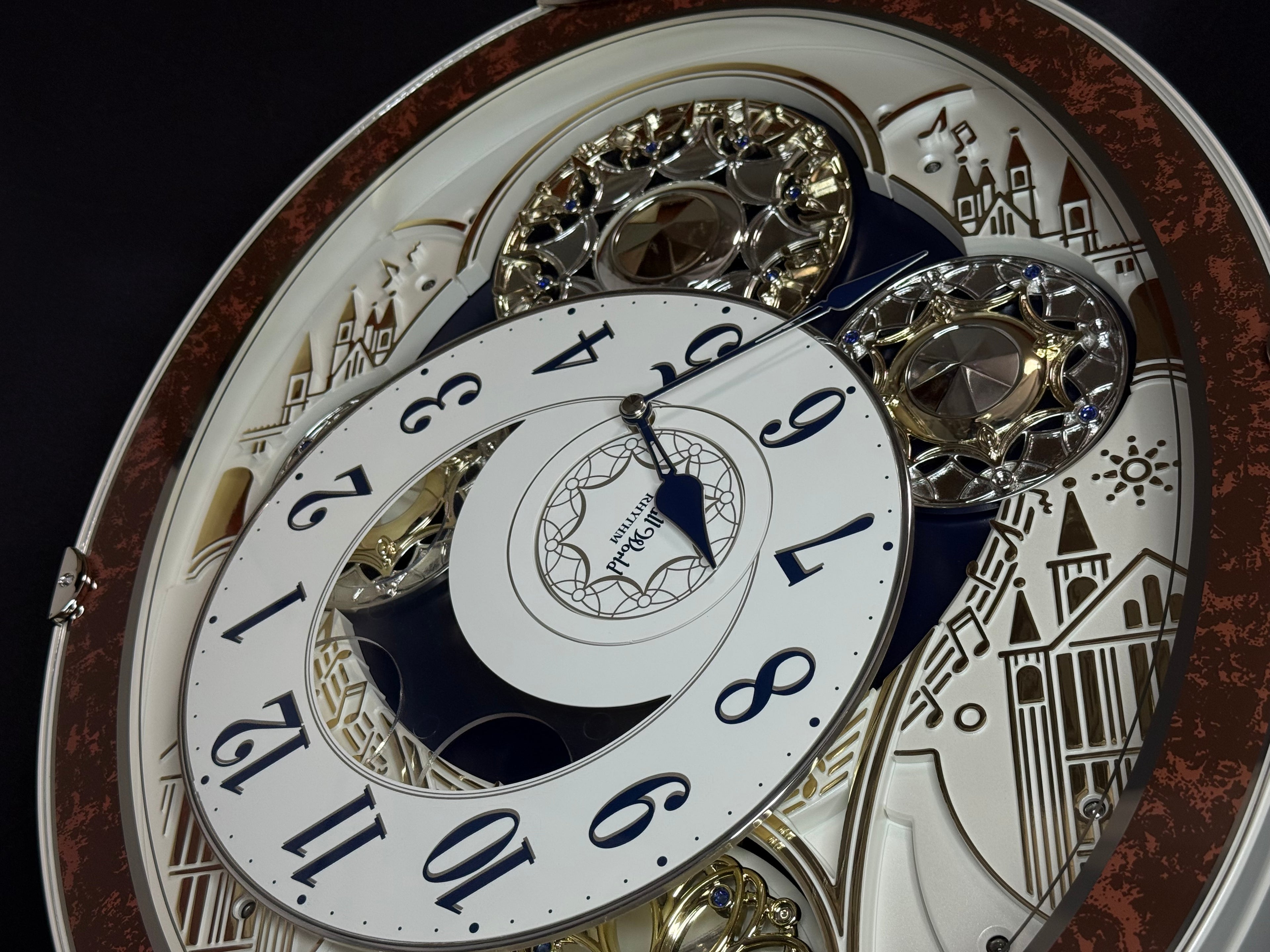 Rhythm "Gala III" Magic Motion Musical Wall Clock with Rotating Dial - 4MH447WU23