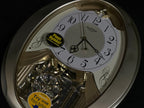 Rhythm “Champagne Snowflake” Musical Motion Decorative Pendulum Wall Clock - 4MJ447WU18