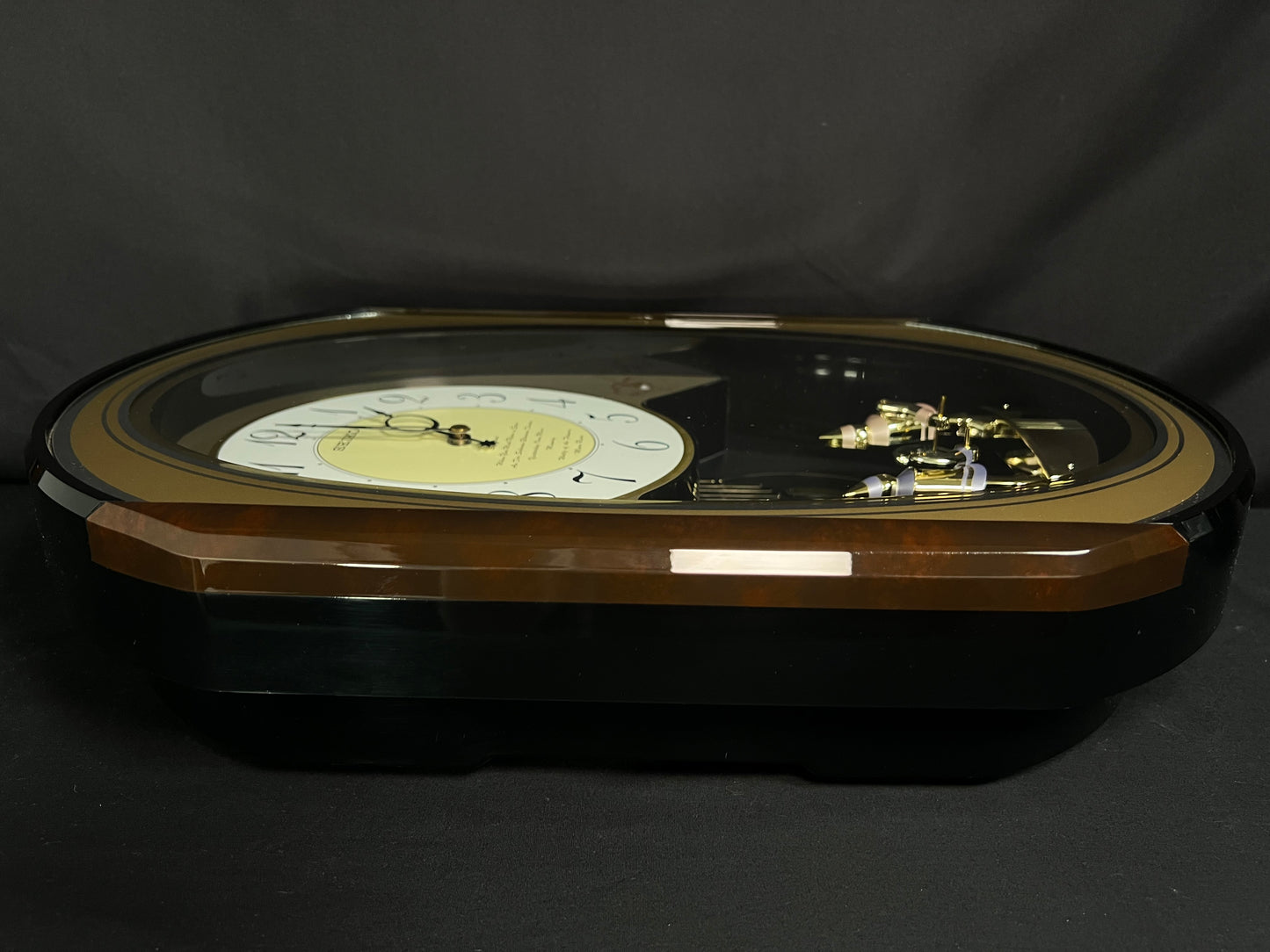 Seiko QXM124GRH "Music Disc Figurines" Melodies in Motion Musical Moving Wall Clock with Popular Music
