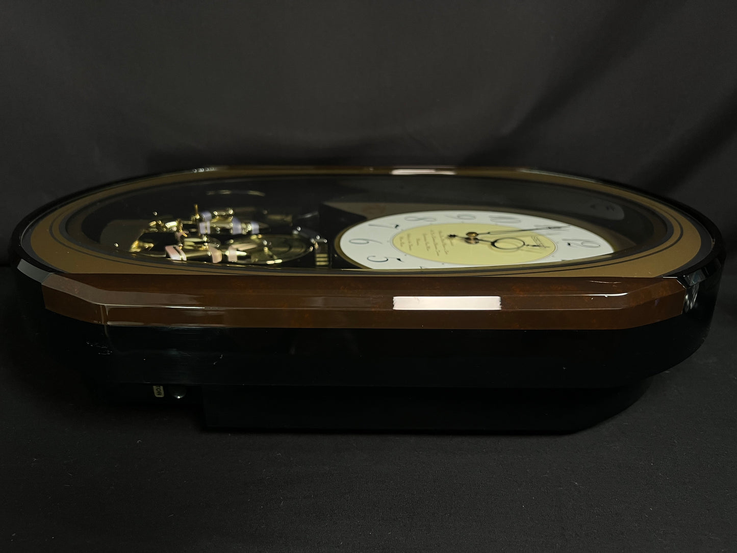 Seiko QXM124GRH "Music Disc Figurines" Melodies in Motion Musical Moving Wall Clock with Popular Music