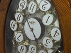 Rhythm "SSS Encore" Magic Motion Musical Wooden Wall Clock with Animated Moving Dial and Popular Melodies - 4MH810-R06