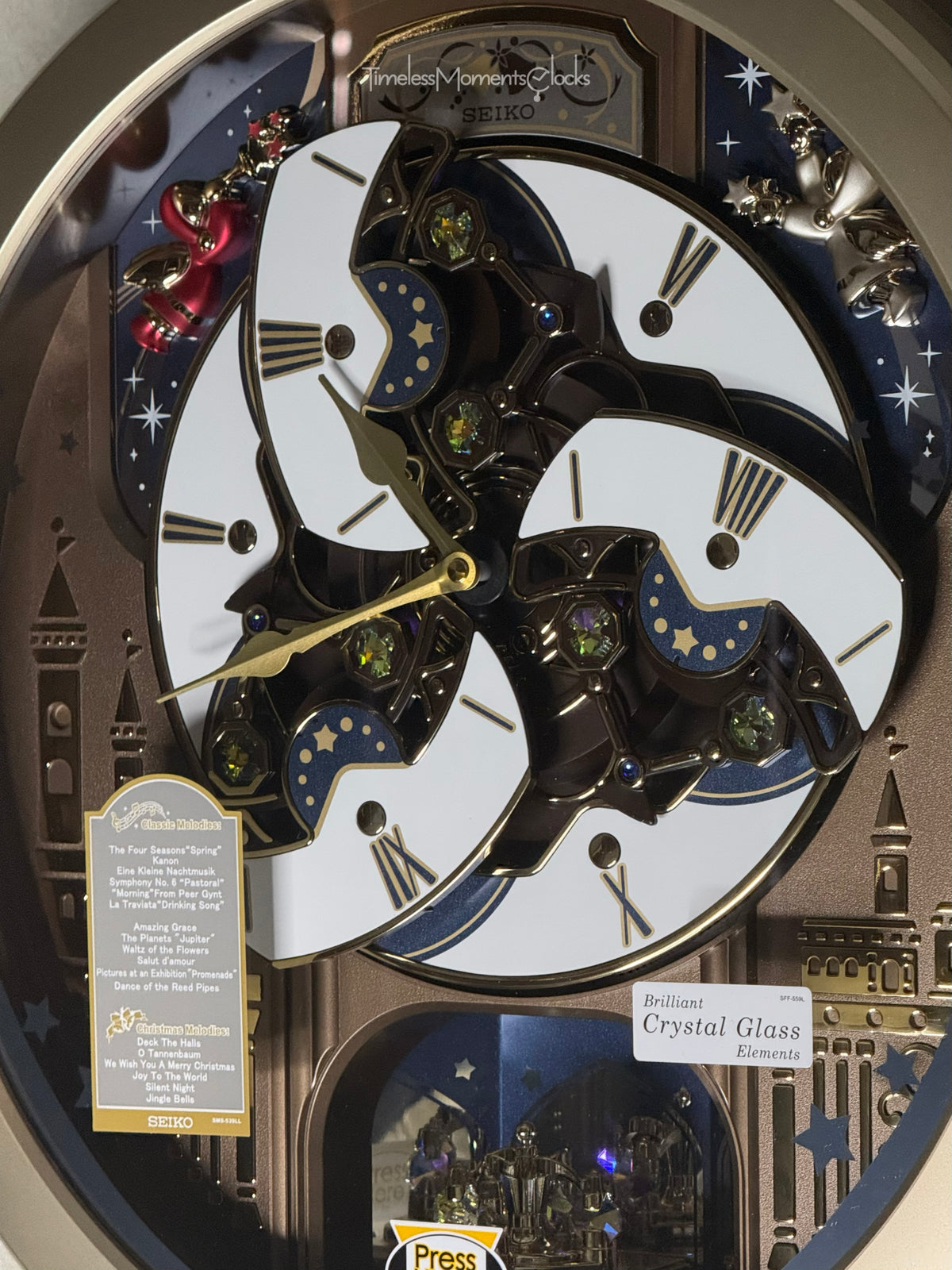 Seiko QXM350GRH "Starry Skyline" Melodies in Motion Dancing Dial Musical Wall Clock with 18 Songs