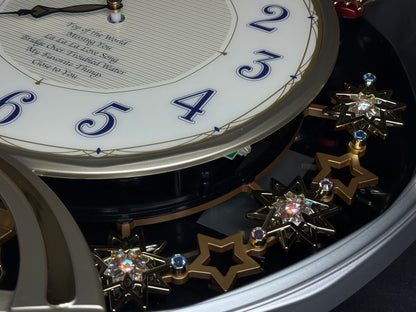 Seiko QXM155SRH "Twinkling Stars" Melodies in Motion Musical Decorative Pendulum Wall Clock with Popular Music