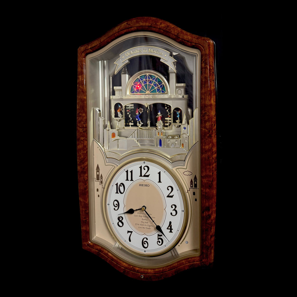 Seiko QXM135BRH "Lover’s Castle" Melodies in Motion Musical Moving Wall Clock with Popular Melodies