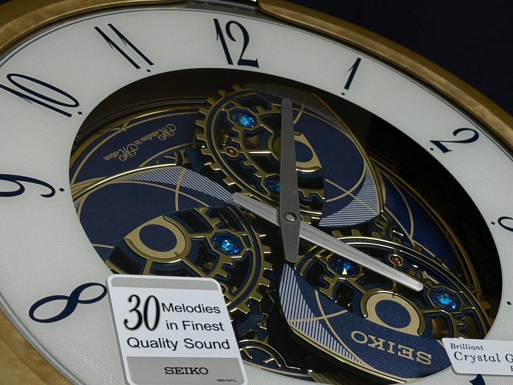 Seiko QXM387GRH “Kingly Mechanical” Melodies in Motion Dancing Dial Musical Wall Clock with 30 Songs