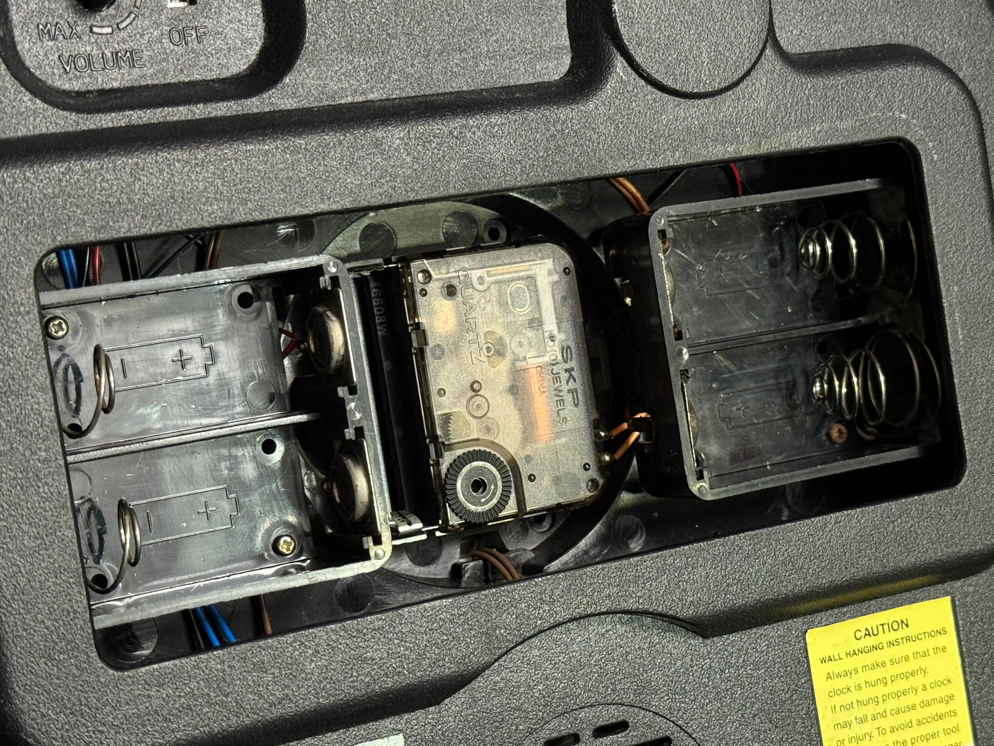 Seiko QXM106SRH "Twirling Numbers" Melodies in Motion Musical Wall Clock with Moving Dial