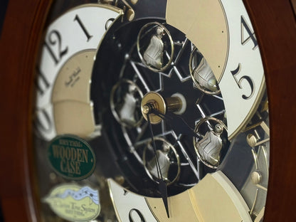 Rhythm "CTS Nostalgia" Moving Dial Magic Motion Musical Wooden Wall Clock with Popular Melodies - 4MH780-R06