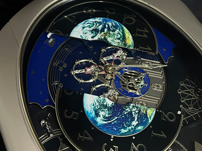 Rhythm “Timecracker 2000” Limited Edition Moving Earth Dial Magic Motion Musical Wall Clock with Popular Melodies - 4MH751NR19
