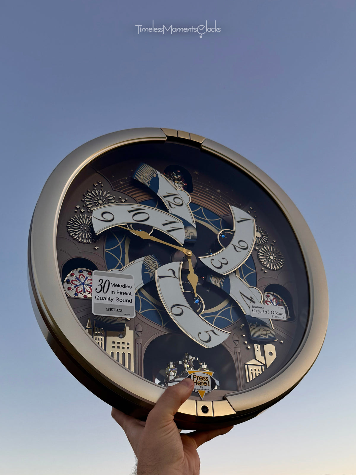 Seiko QXM620GRH "Golden Festival" Melodies in Motion Dancing Dial Musical Wall Clock with 30 Songs