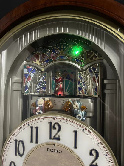 Seiko QXM123BRH "Broadway Showtunes Dropping Dial" Melodies in Motion Musical Moving Wall Clock with Popular Melodies
