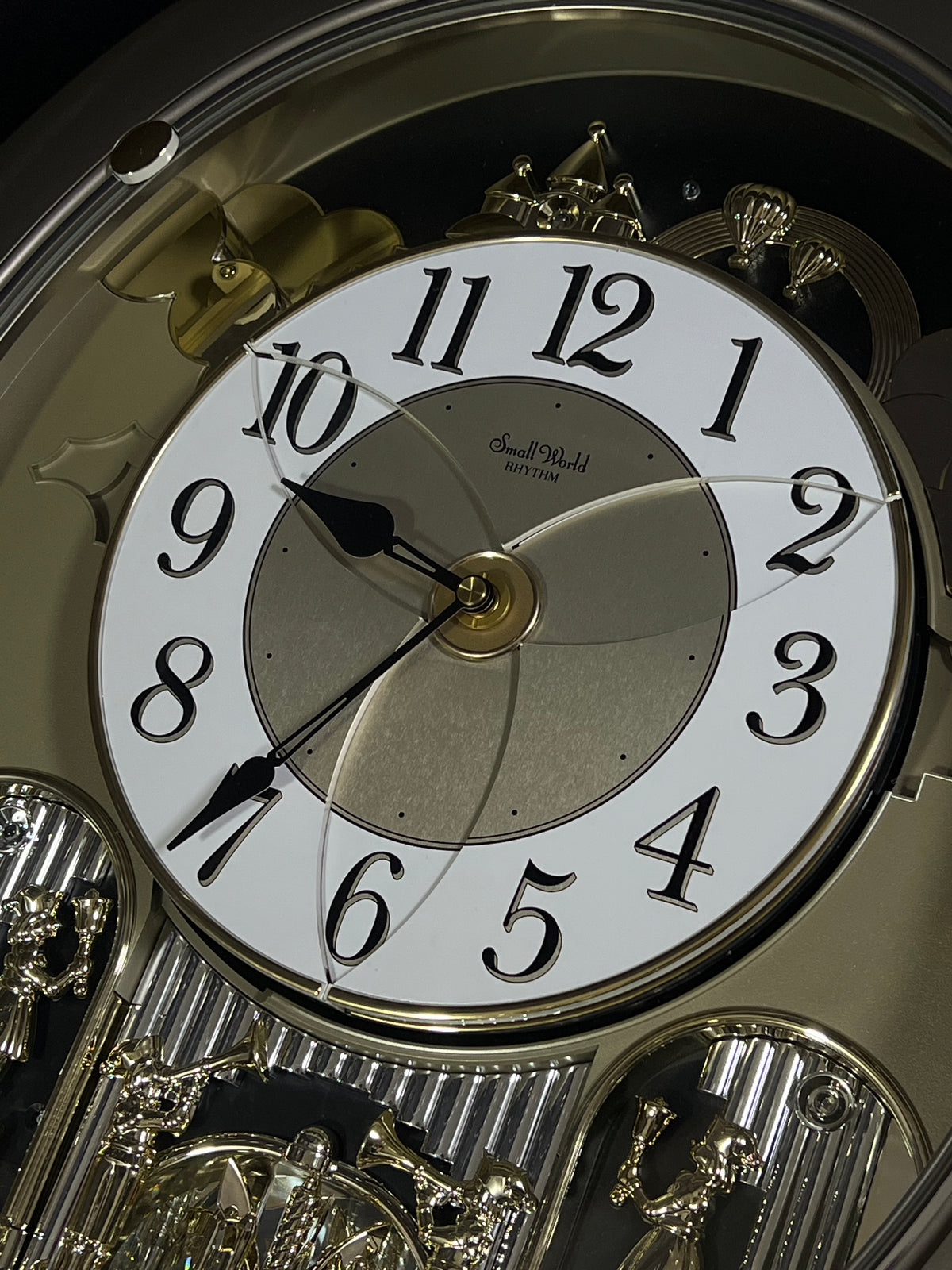 Rhythm "Golden Stars" Moving Dial Magic Motion Musical Wall Clock - 4MH843WD19