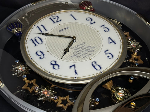Seiko QXM155SRH "Twinkling Stars" Melodies in Motion Musical Decorative Pendulum Wall Clock with Popular Music