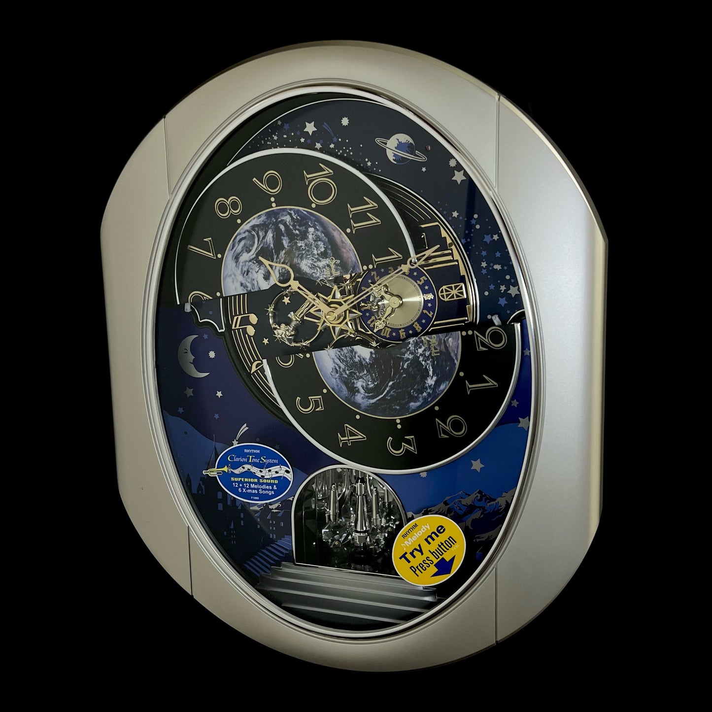 Rhythm “Peaceful Cosmos II” Moving Earth Dial Magic Motion Musical Wall Clock - 4MH408WU19