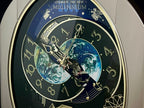 Rhythm “Timecracker 2000” Limited Edition Moving Earth Dial Magic Motion Musical Wall Clock with Popular Melodies - 4MH751NR19