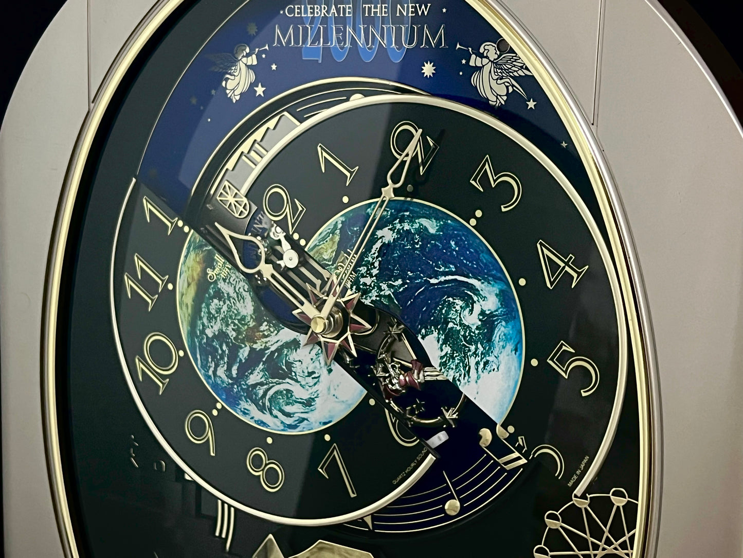 Rhythm “Timecracker 2000” Limited Edition Moving Earth Dial Magic Motion Musical Wall Clock with Popular Melodies - 4MH751NR19