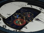 Rhythm “Small World Partage Home (Blue)” Moving Dial Magic Motion Musical Wall Clock with Popular Melodies - 4MH754RH04