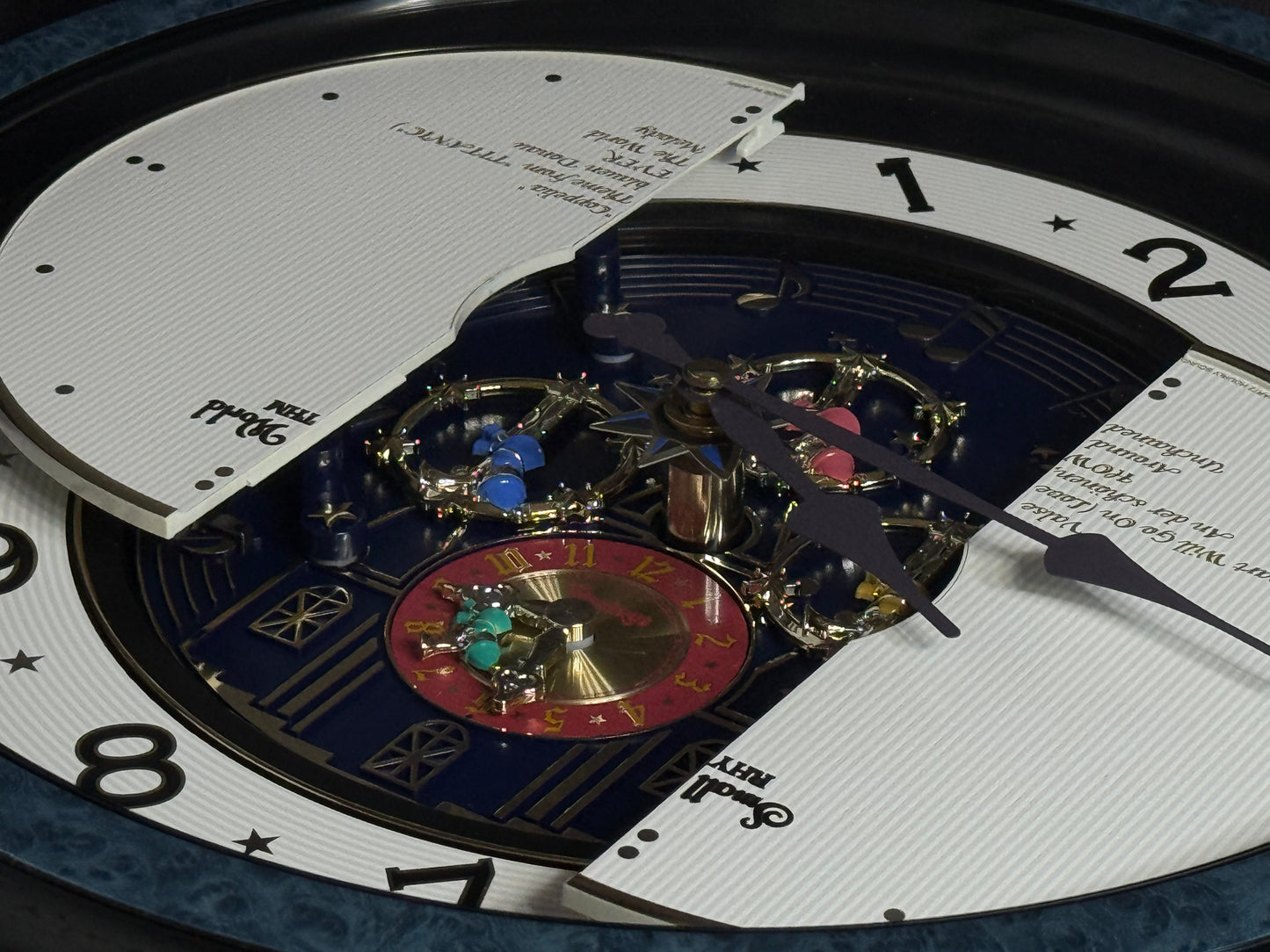 Rhythm “Small World Partage Home (Blue)” Moving Dial Magic Motion Musical Wall Clock with Popular Melodies - 4MH754RH04